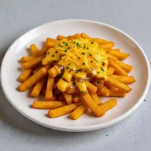 Ppapas Fritas + Queso Cheddar + Ciboulette + Cremoso Choclo