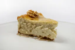 Porción Cheesecake Queso Azul Y Miel