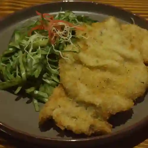 Fetuccini Al Pesto con Milanesa de Lomo Fino