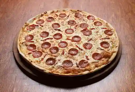 Pizza pepperoni + Bebida 1.5 lts x$7.990