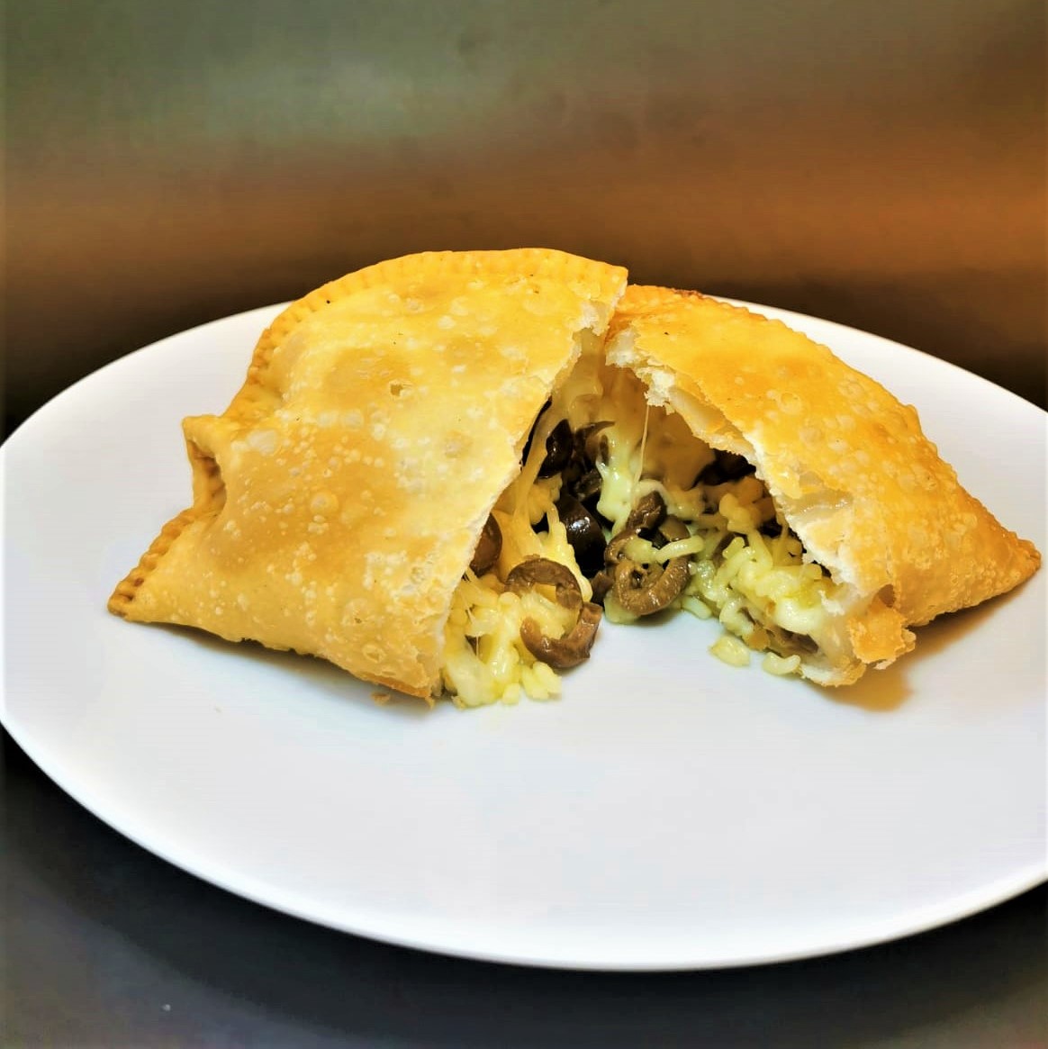 Empanadas La Tía Chabe a Domicilio calle >Julio Covarrubias 9607