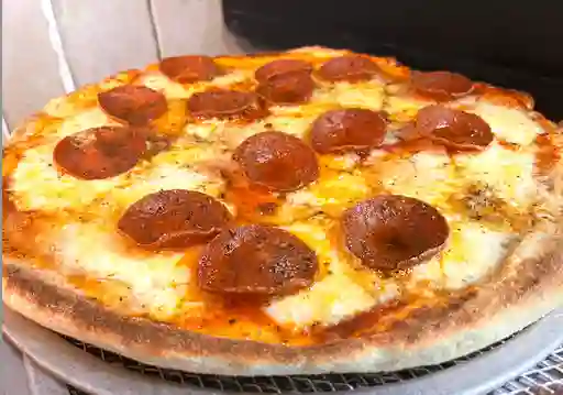 Pizza Pepperoni O Jamón.