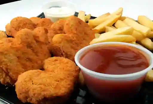 Nuggets con Papas Fritas