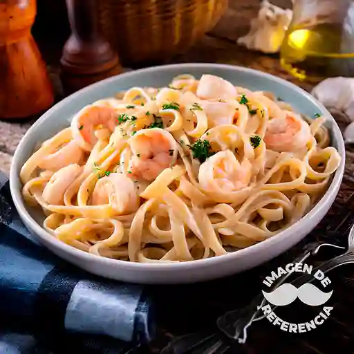 Fetuccini al Pesto con Lomo Salteado