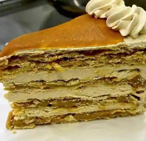 Porción torta lúcuma
