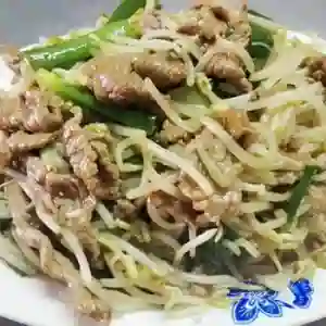 Diente De Dragón Cerdo Con Arroz Chaufan