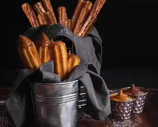 12 Churros Españoles con 4 Rellenos DL y 2 Salsas