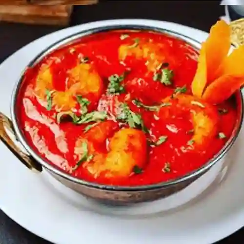 Jheenga masala con arroz basmati