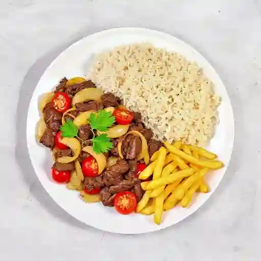 Lomo Salteado Con Cebolla Y Tomate