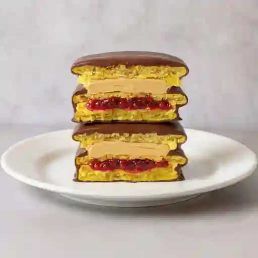 Alfajor maní/frambuesa chocolate negro