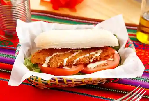 Sanguche de Milanesa con Papas Fritas.