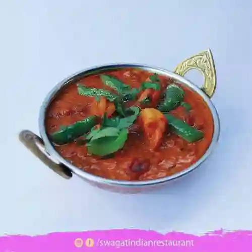 Jheenga tawa con arroz basmati