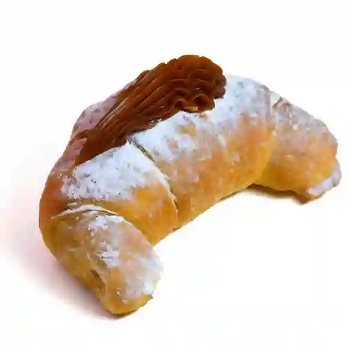 Medialuna rellena manjar