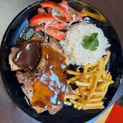 Chuleta de Cerdo + Papas+bebida 220ml