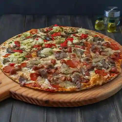 Pizza Carnívora Mitad Pizza Vegetariana