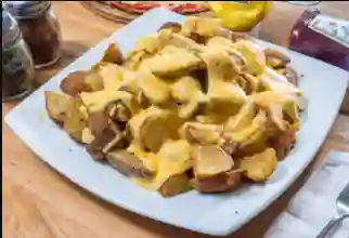 Papas Fritas con Queso Cheddar