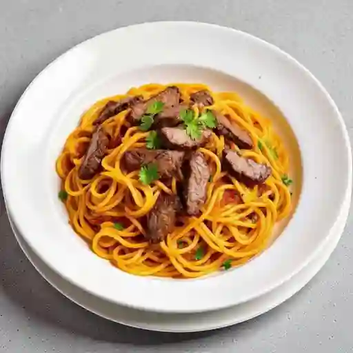 Lomo saltado con fideos a la huancaina