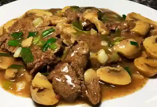 Carne con Champiñones