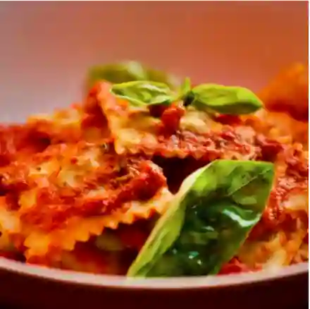 Ravioli de Ricotta Pomodoro y Basilico.