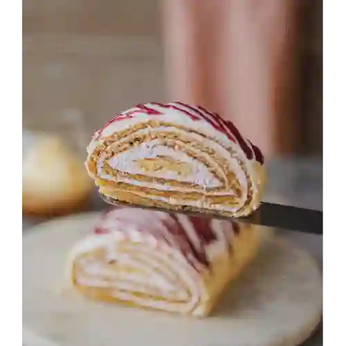 Brazo frambuesa crema porción