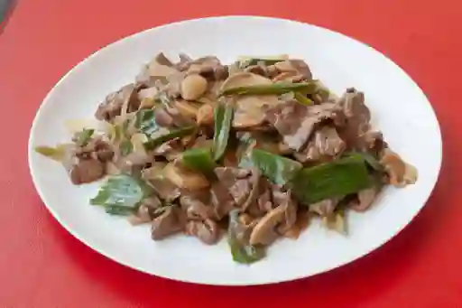 Carne con Champinones
