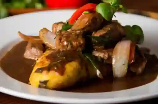 Lomo Salteado con Tacu Tacu