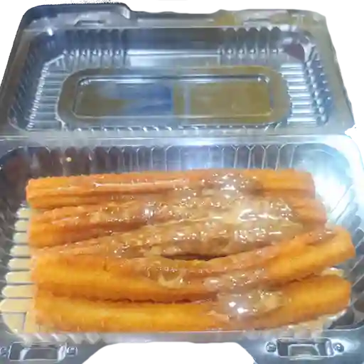 5 Churros calientitos con manjar/azúcar