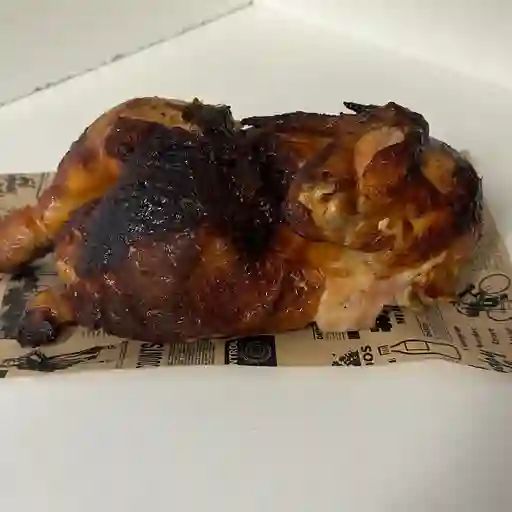 Medio pollo asado jugoso