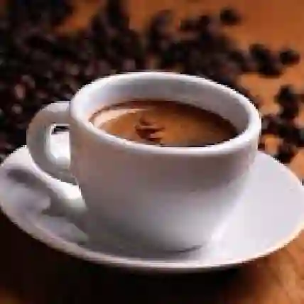 Café espresso machiato de grano de 4 oz / 113 ml.
