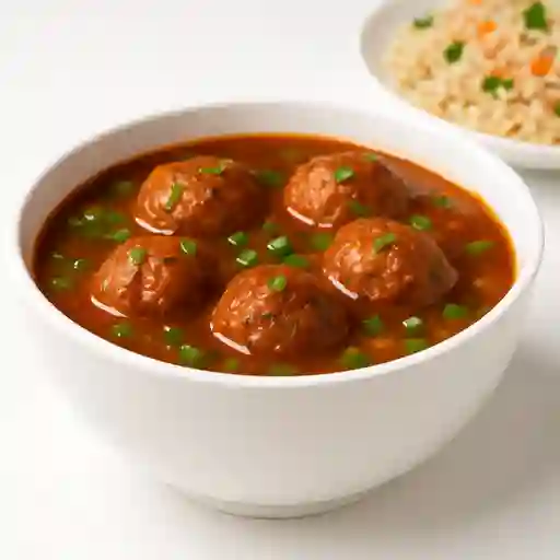 Veg manchurian gravey con arroz frito