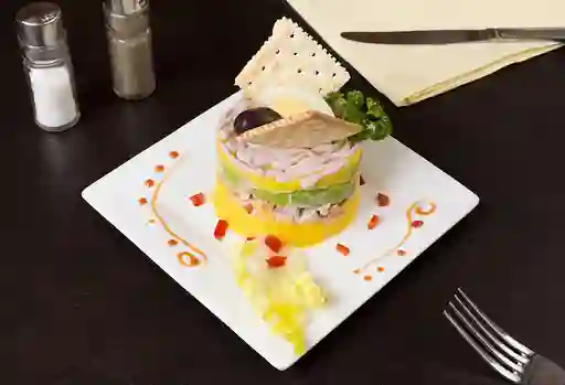 Causa de Pulpo con Salsa de Olivo