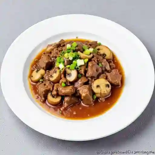 Carne con Champiñones