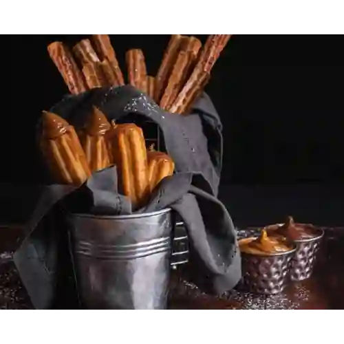 12Churros Españoles + 4 Rellenos Dl + 2 Salsas