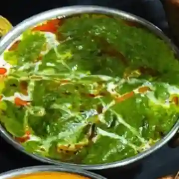 Mutton saagwala con arroz basmati