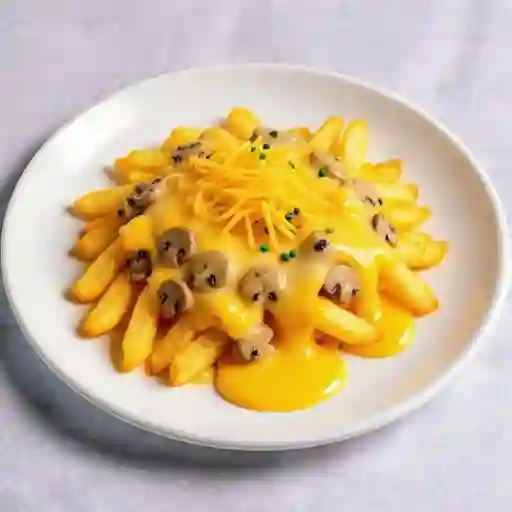 Papas Fritas + Queso Cheddar + Ciboulette + Salsa Champinon