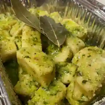 Gnocchi en Salsa Pesto y Parmesano.