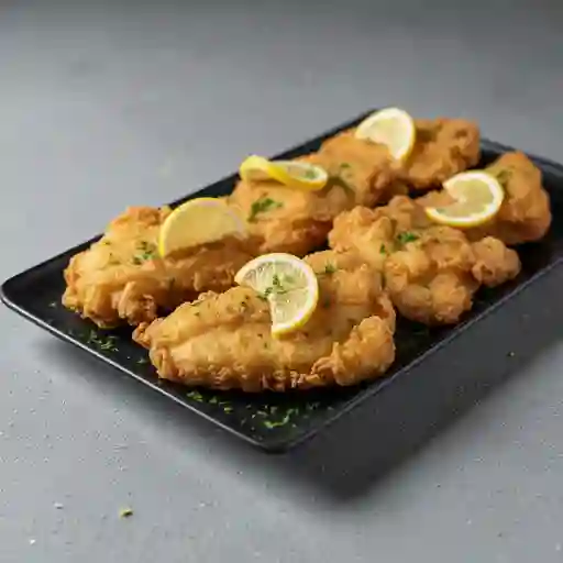 Pescado frito con acompañamiento