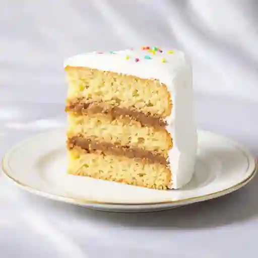 Porción torta bizcocho manjar nuez