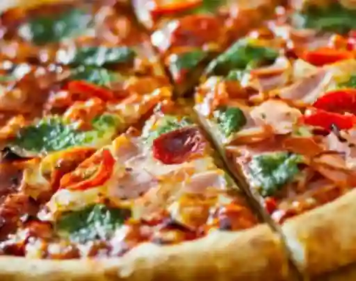 Pizza Artesanal Pesto y Tomates