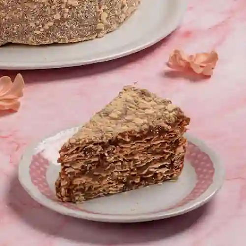 Porción torta hojarasca frambuesa