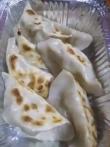 7 Unidades de Gyosas de Pollo O de Cerdo