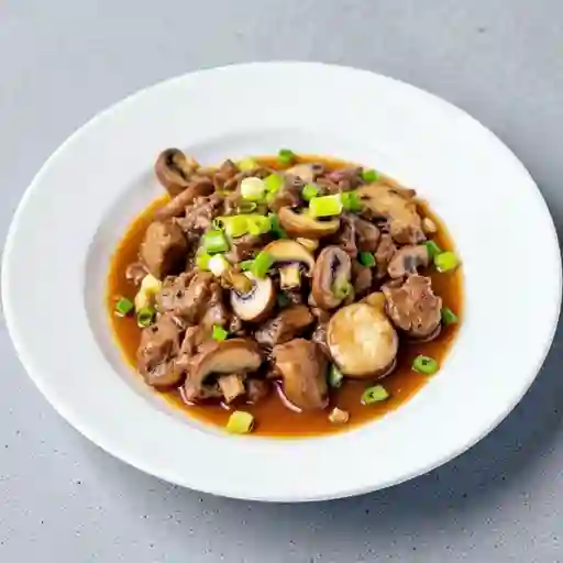 Carne Con Champinones