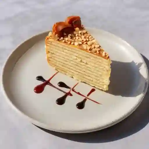 Panqueque manjar nuez trozo